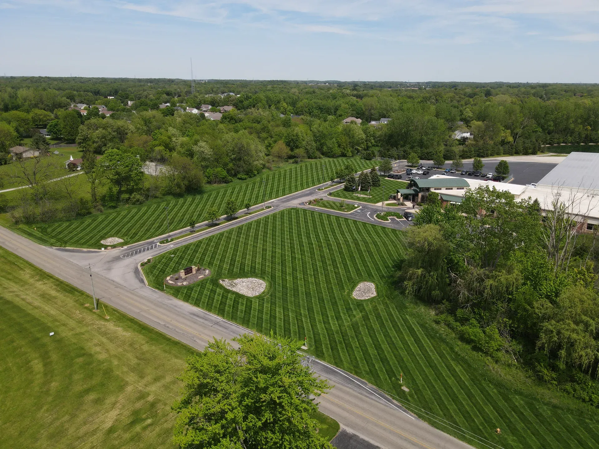 Aerial view of a large striped lawn on a northern Indiana property